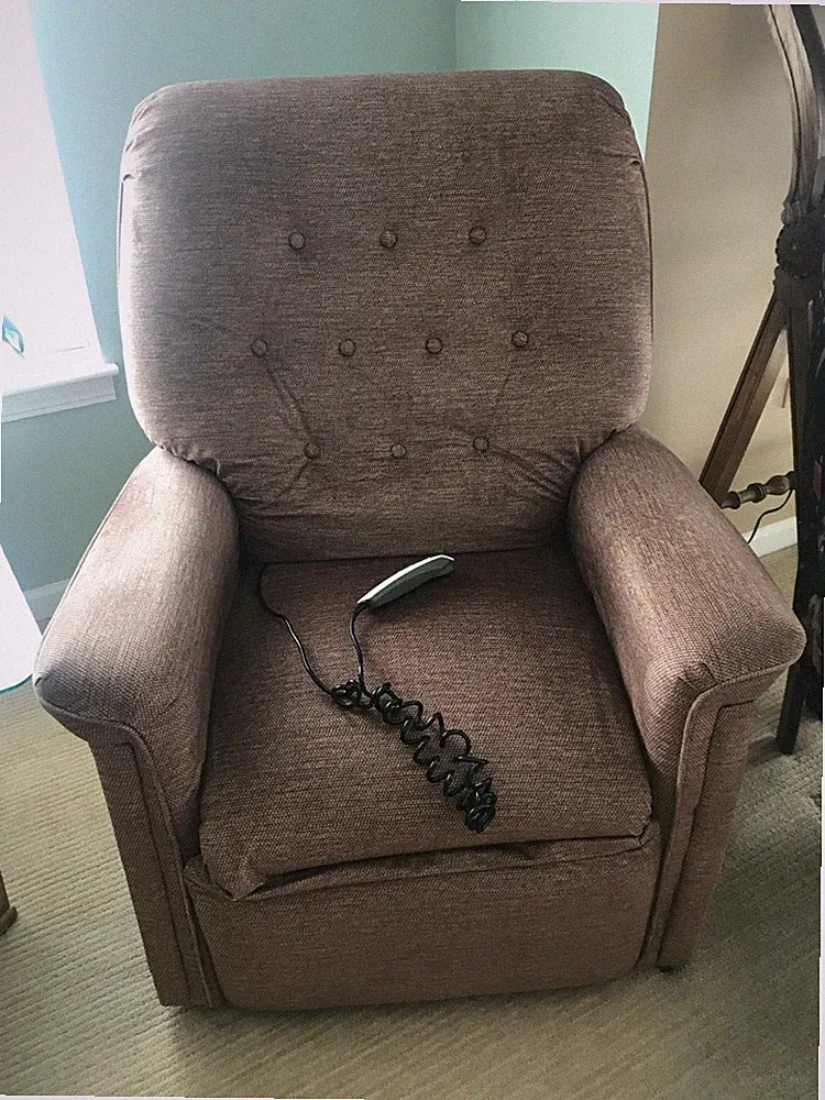 Recliner for elderly that is remote controlled and extends up and down flat.